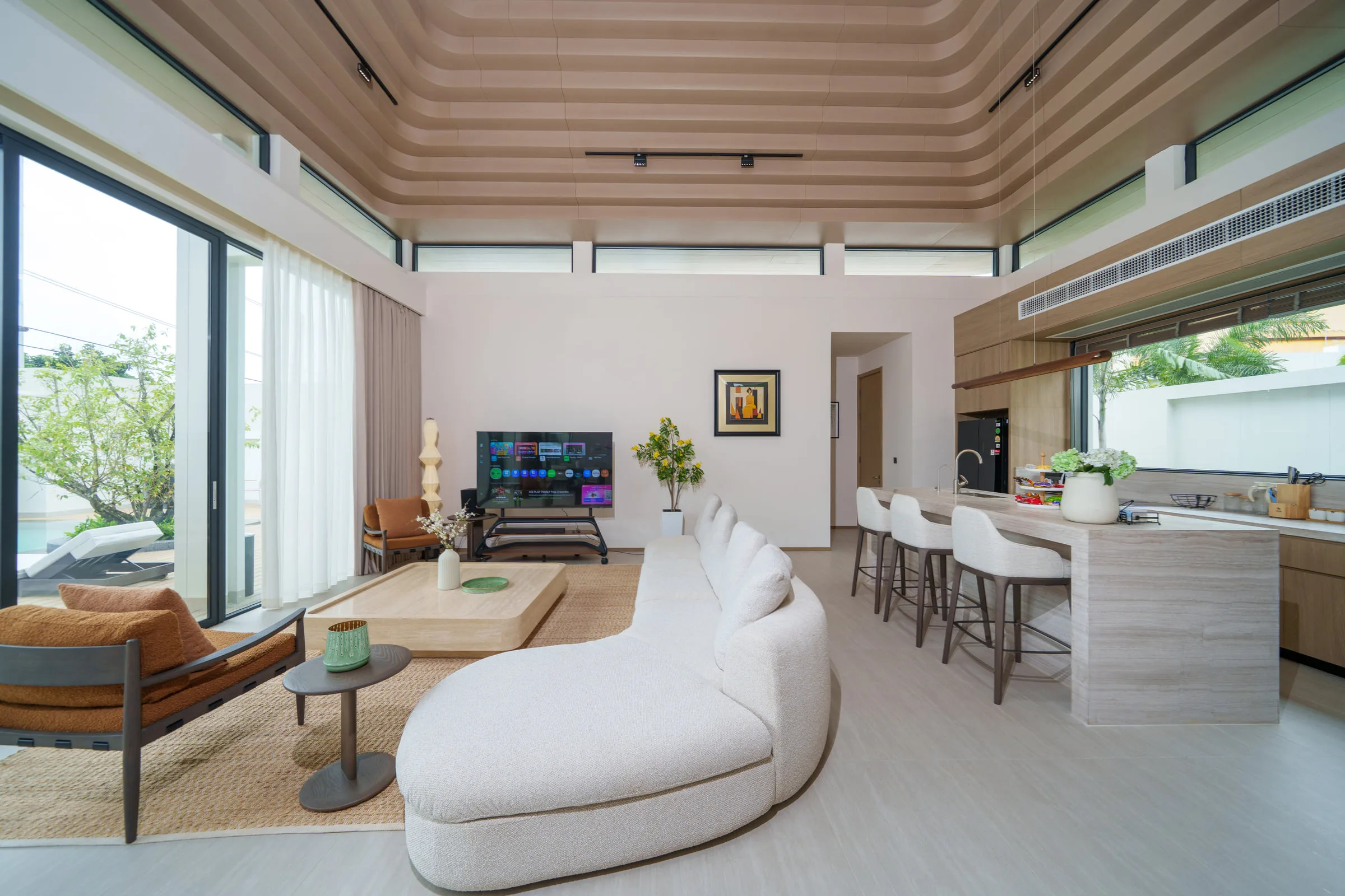 Dining table for eight under two sculptural pendant lights